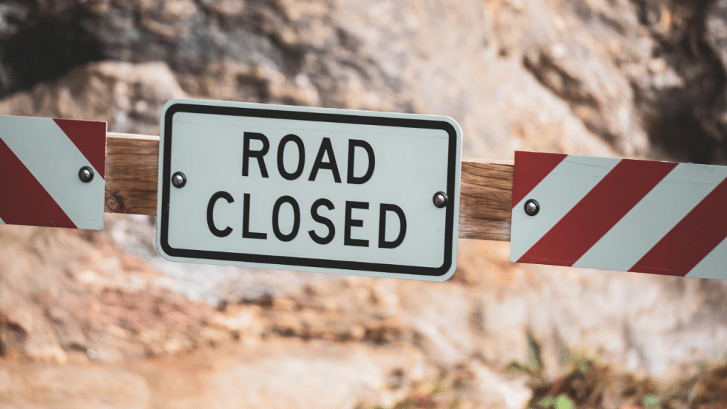 a signal ROAD CLOSED on a road